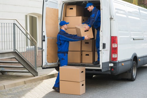 Large office furniture being prepared for transport
