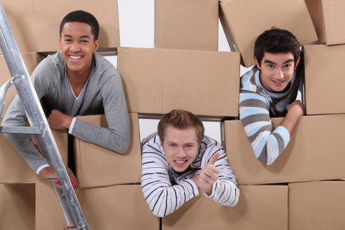 Packed boxes and furniture arranged in a Cheam storage unit