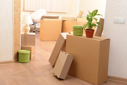 Organized storage unit with packed boxes and furniture for short-term use